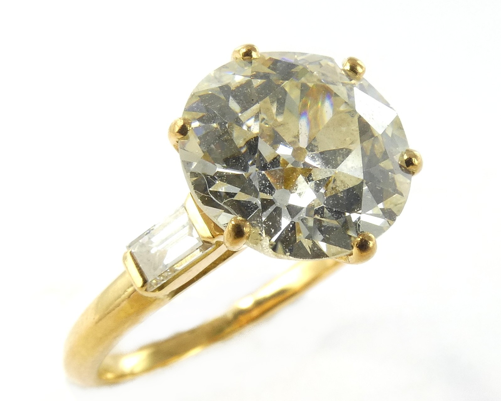 Lot 26 — 1 Bague Or 750 mil. Poinçonnée, ornée d'un brillant solitair